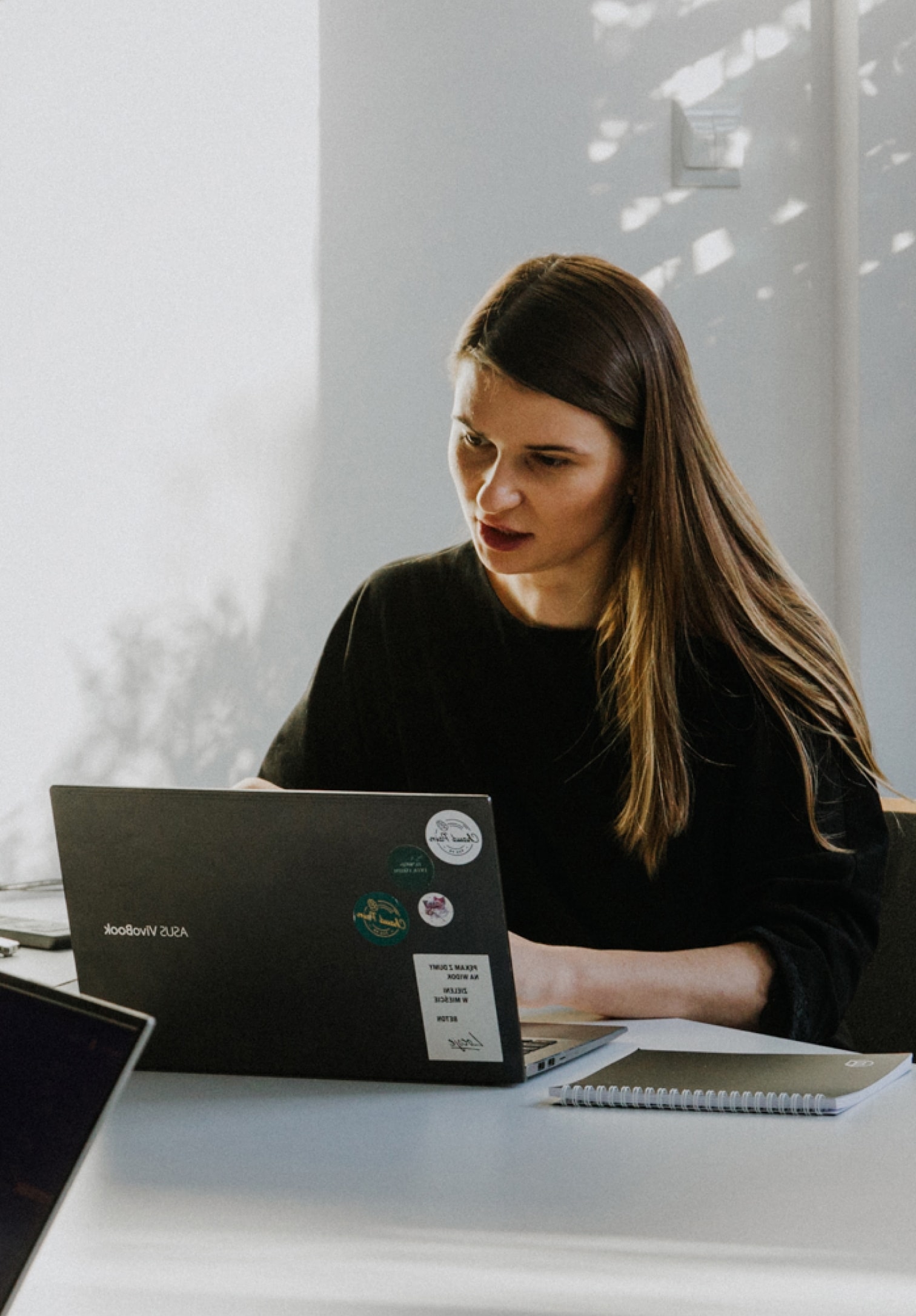 woman working on laptop